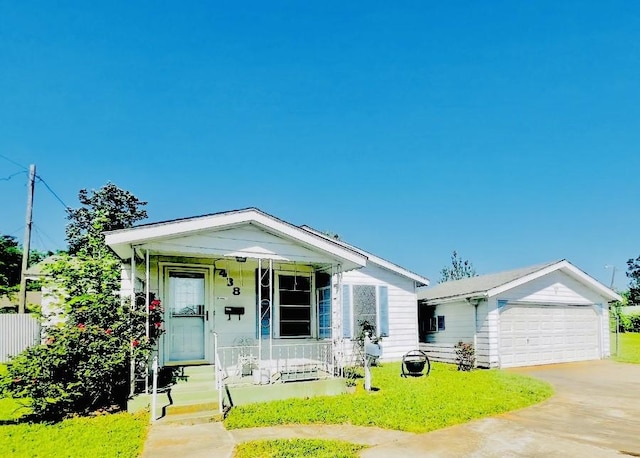 438 Atkins St, Sulphur Springs, TX 75482 - view of front of house with a porch, driveway, and a garage