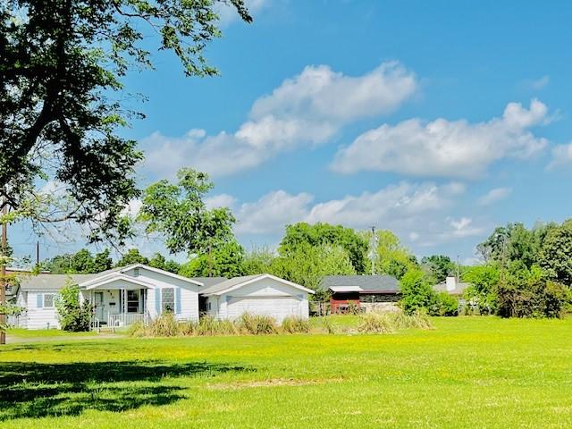 438 Atkins St, Sulphur Springs, TX 75482 - exterior space with a front yard