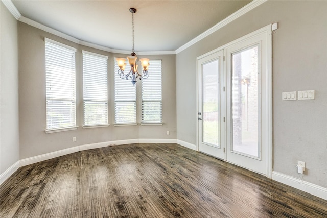 interior space with baseboards, crown molding, dark wood-style floors, and an inviting chandelier