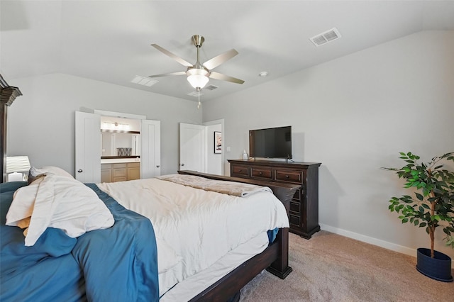 bedroom with visible vents, light carpet, and vaulted ceiling