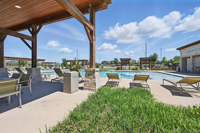 pool with a patio