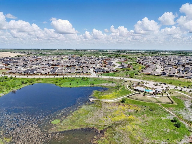 aerial view with a water view and a residential view