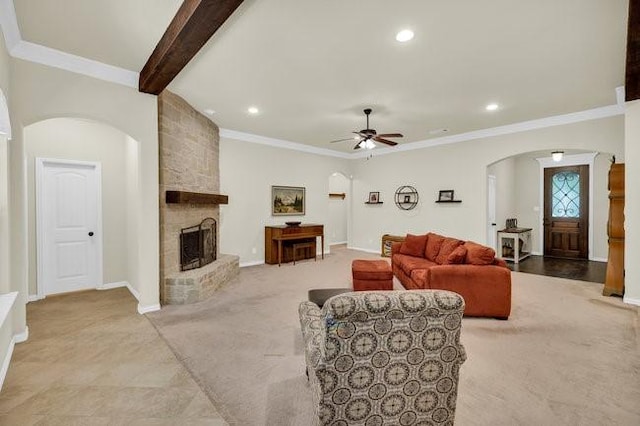 8450 Old Springtown Rd, Springtown, TX 76082 - living area featuring recessed lighting, a ceiling fan, light carpet, arched walkways, and a fireplace