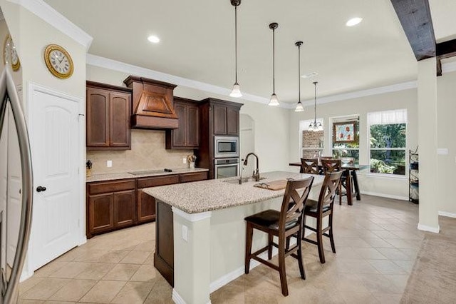 8450 Old Springtown Rd, Springtown, TX 76082 - kitchen with a sink, decorative backsplash, appliances with stainless steel finishes, custom range hood, and ornamental molding