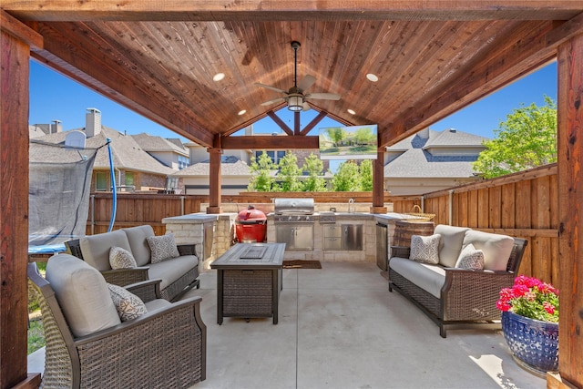 view of patio / terrace featuring outdoor lounge area, a ceiling fan, a fenced backyard, and area for grilling