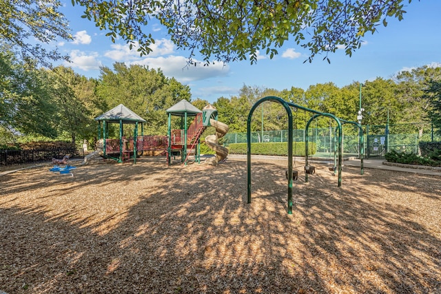 community jungle gym with fence