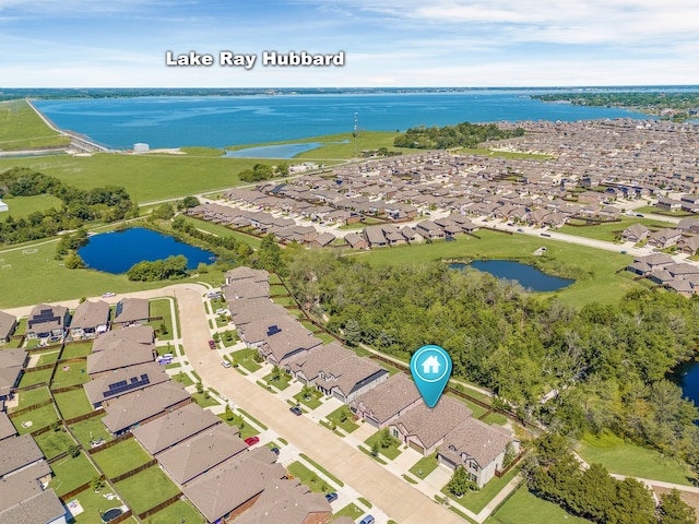 aerial view featuring a residential view and a water view