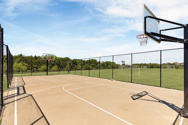 view of sport court with community basketball court and fence
