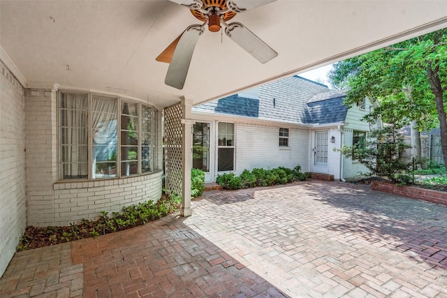 view of patio featuring ceiling fan