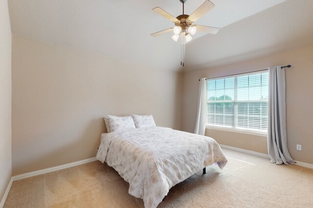 1206 Greenway Dr, Allen, TX 75013 - empty room featuring light carpet, a ceiling fan, vaulted ceiling, and baseboards