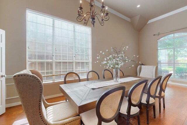 1206 Greenway Dr, Allen, TX 75013 - living room with arched walkways, ceiling fan, wood-type flooring, and baseboards
