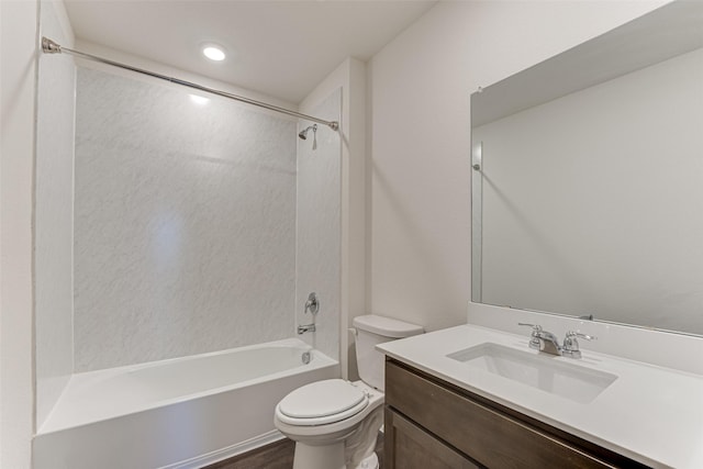 bathroom with toilet, shower / bathtub combination, vanity, and wood finished floors