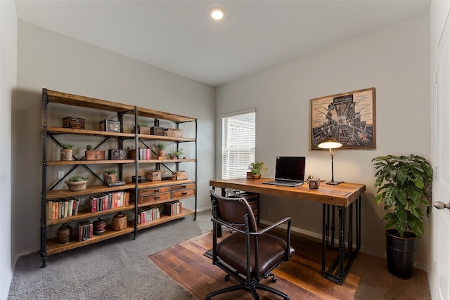 office space with baseboards