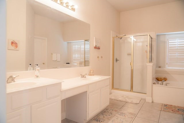 436 Dakota Dr, Murphy, TX 75094 - bathroom featuring a shower stall, tile patterned flooring, a garden tub, and vanity