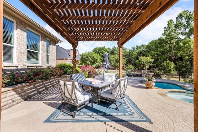 view of patio / terrace with fence, a pergola, a pool with connected hot tub, and outdoor dining space