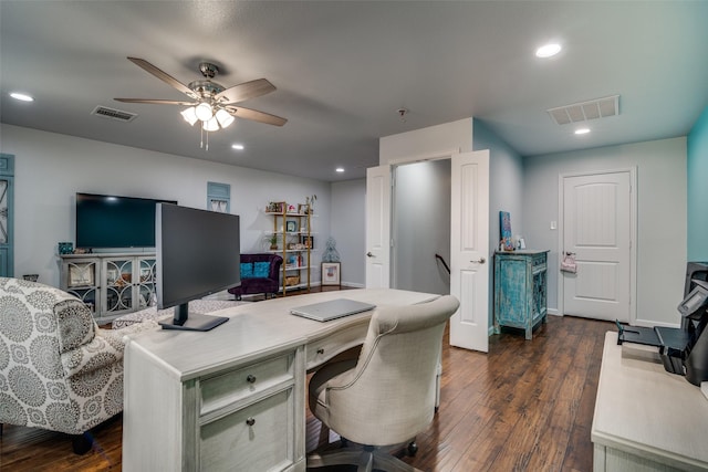 office featuring a ceiling fan, visible vents, recessed lighting, and dark wood-style flooring