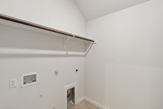 washroom featuring gas dryer hookup, hookup for an electric dryer, laundry area, washer hookup, and light tile patterned flooring