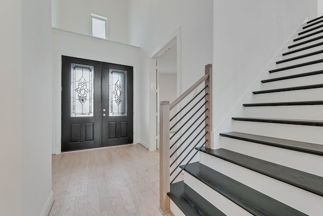 3737 Selborne Dr, Rockwall, TX 75032 - entryway featuring light wood-type flooring, plenty of natural light, and stairway