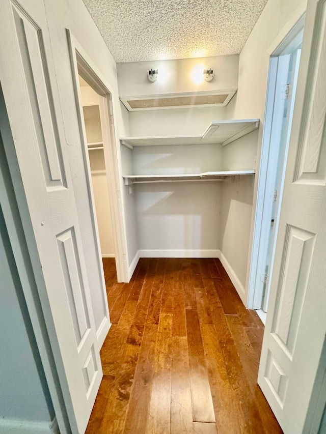 interior space with dark wood-style floors