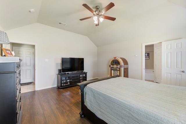 bedroom featuring a ceiling fan, visible vents, baseboards, lofted ceiling, and dark wood-style floors