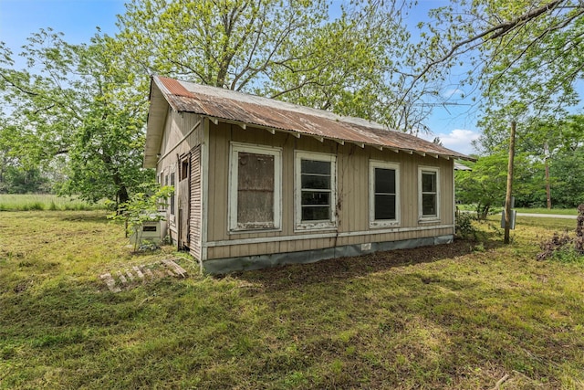 1605 Tyler St, Thornton, TX 76687 - view of side of property with a yard