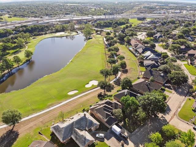aerial view with a water view and a residential view