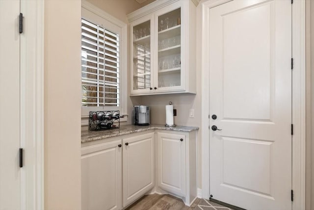 1608 Ridgewood Dr, Waco, TX 76710 - bar featuring light wood-style floors