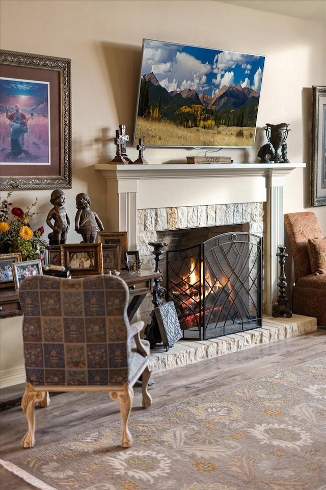 1608 Ridgewood Dr, Waco, TX 76710 - interior space with a lit fireplace and wood finished floors