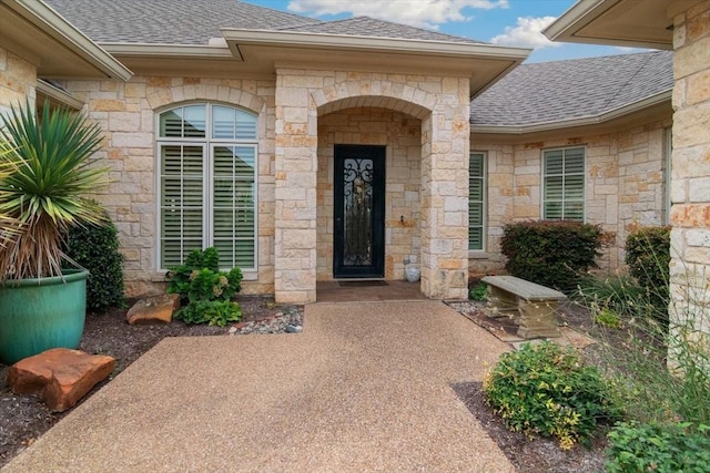 1608 Ridgewood Dr, Waco, TX 76710 - property entrance featuring roof with shingles and stone siding