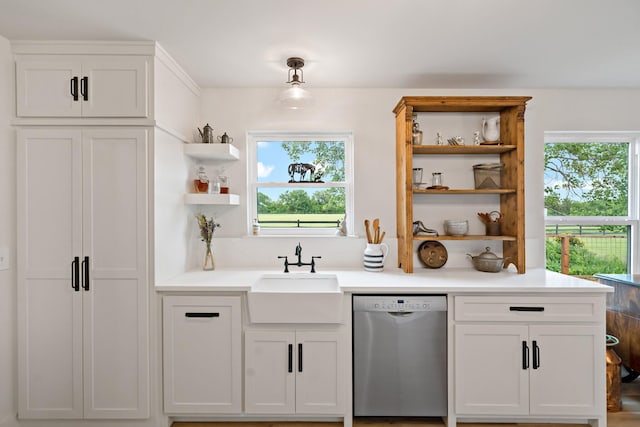 bar featuring a sink and dishwasher