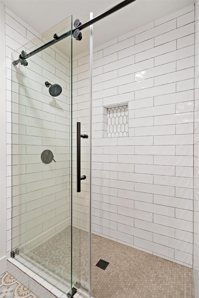 full bath featuring a stall shower