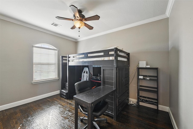 bedroom featuring wood finished floors, visible vents, crown molding, and baseboards