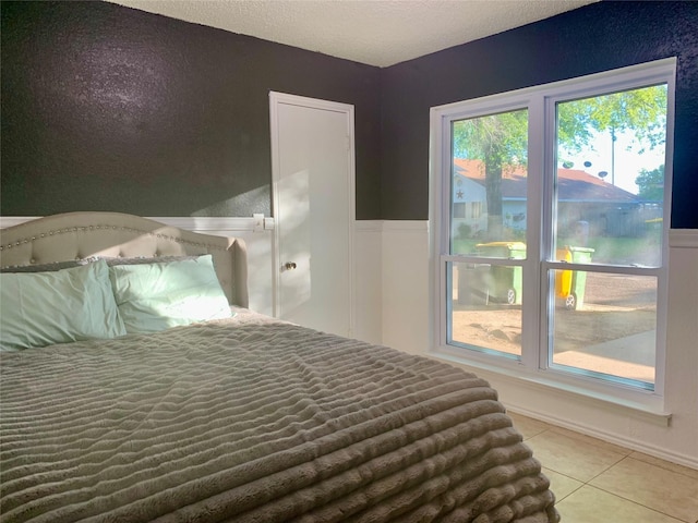 bedroom featuring tile patterned floors