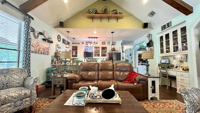 living room with recessed lighting, wood finished floors, visible vents, and high vaulted ceiling