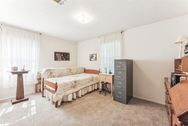3055 Midway Rd, Grapevine, TX 76092 - bedroom with light carpet, visible vents, and baseboards