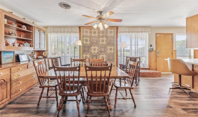 3055 Midway Rd, Grapevine, TX 76092 - dining space with a ceiling fan, dark wood-style flooring, and visible vents
