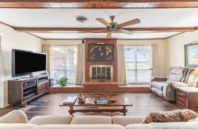 3055 Midway Rd, Grapevine, TX 76092 - living area featuring beamed ceiling, wood finished floors, visible vents, and ceiling fan