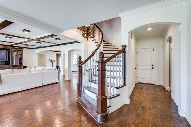6100 Old Clarksville Rd, Reno, TX 75462 - foyer featuring arched walkways, wood finished floors, stairs, and ornamental molding