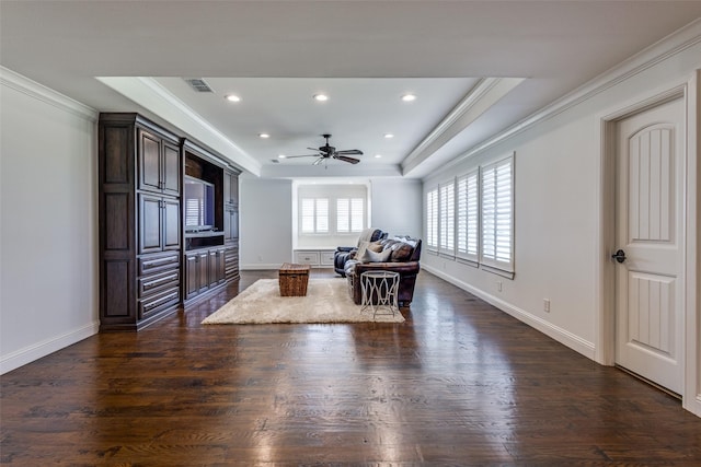 6100 Old Clarksville Rd, Reno, TX 75462 - living room with a raised ceiling, dark wood-style floors, and ornamental molding