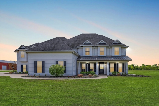 6100 Old Clarksville Rd, Reno, TX 75462 - view of front of house with roof with shingles, a porch, a front lawn, and a standing seam roof