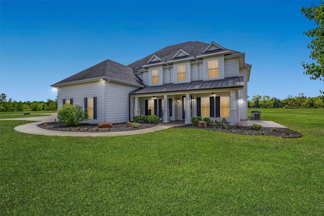 6100 Old Clarksville Rd, Reno, TX 75462 - view of front of property featuring a front lawn, a shingled roof, and covered porch