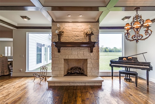 6100 Old Clarksville Rd, Reno, TX 75462 - sitting room featuring wood finished floors, a chandelier, baseboards, coffered ceiling, and ornamental molding