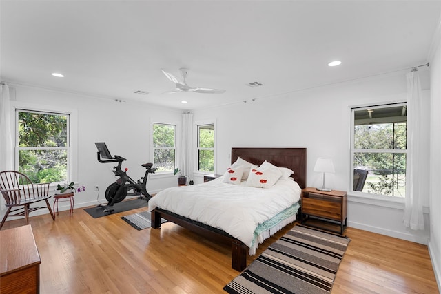 bedroom featuring recessed lighting, baseboards, and light wood-style flooring
