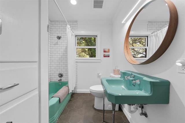 bathroom with visible vents, tile patterned floors, baseboards, toilet, and shower / bathtub combination with curtain