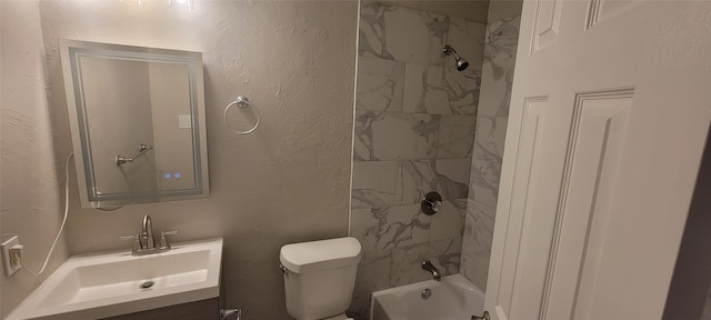 103 Lorie St, Alvarado, TX 76009 - bathroom with toilet, a textured wall, and vanity