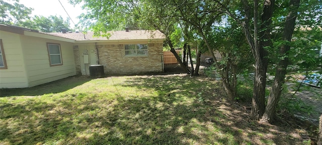 103 Lorie St, Alvarado, TX 76009 - view of yard featuring fence and central AC