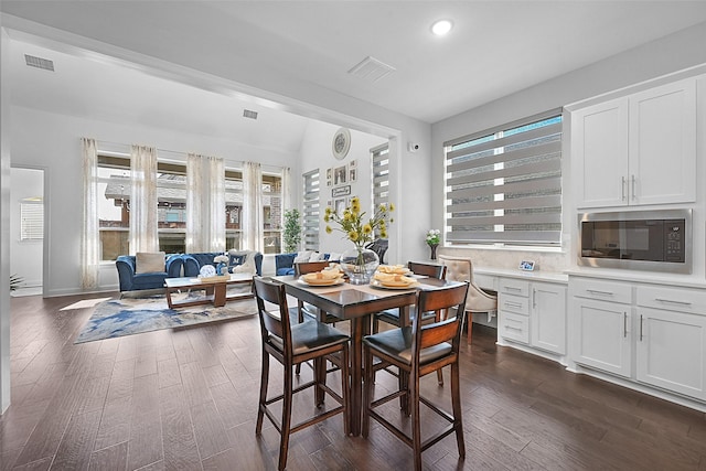 731 Drummond Dr, Prosper, TX 75078 - dining space featuring visible vents, dark wood-style floors, and recessed lighting
