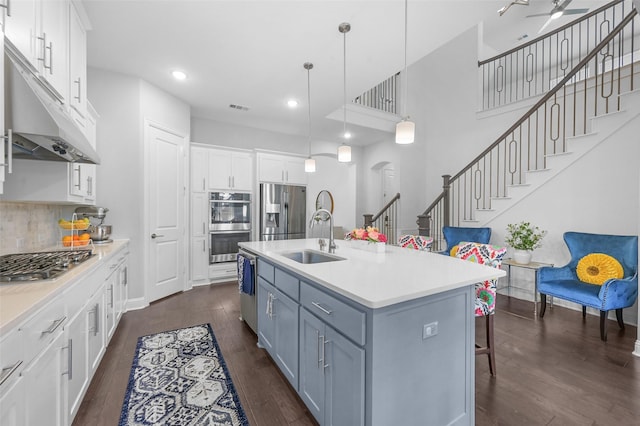 731 Drummond Dr, Prosper, TX 75078 - kitchen featuring white cabinets, a sink, appliances with stainless steel finishes, and dark wood finished floors