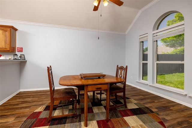 516 Hazelnut Ct, Saginaw, TX 76179 - dining space with lofted ceiling, crown molding, dark wood-type flooring, ceiling fan, and baseboards