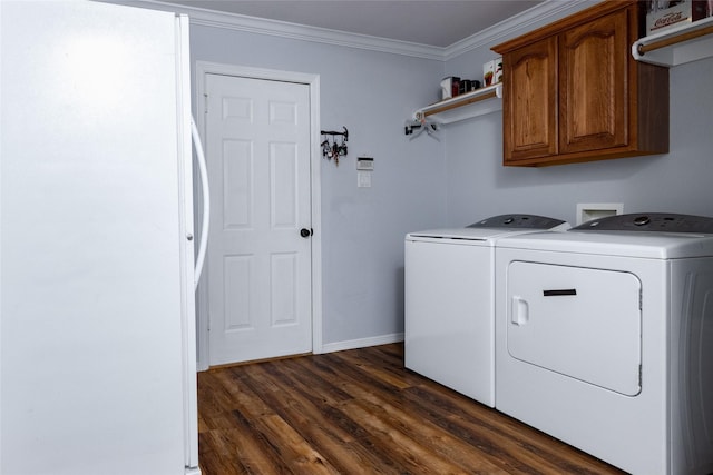 516 Hazelnut Ct, Saginaw, TX 76179 - laundry area with cabinet space, separate washer and dryer, crown molding, dark wood-type flooring, and baseboards